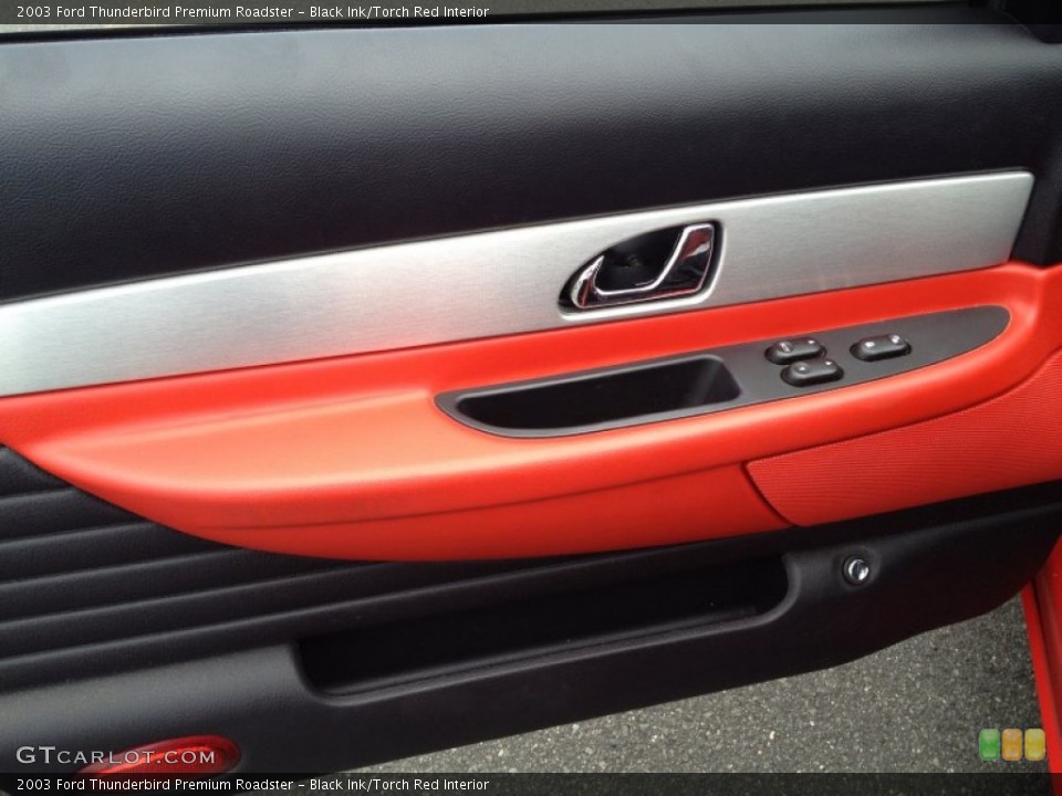 Black Ink/Torch Red Interior Door Panel for the 2003 Ford Thunderbird Premium Roadster #83740885