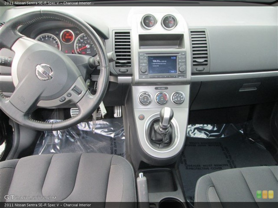 Charcoal Interior Dashboard for the 2011 Nissan Sentra SE-R Spec V #83741515