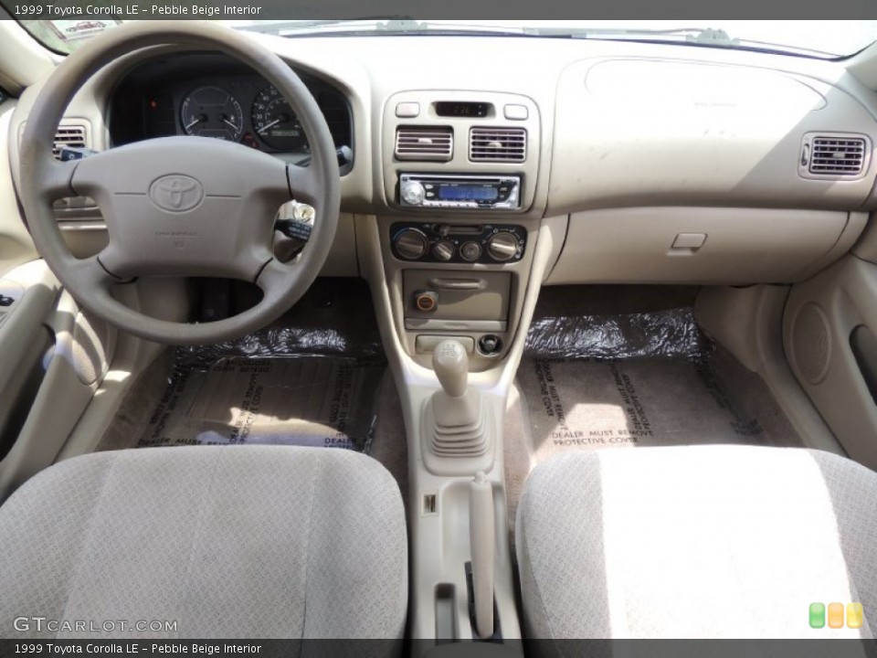 Pebble Beige Interior Dashboard for the 1999 Toyota Corolla LE #83791585