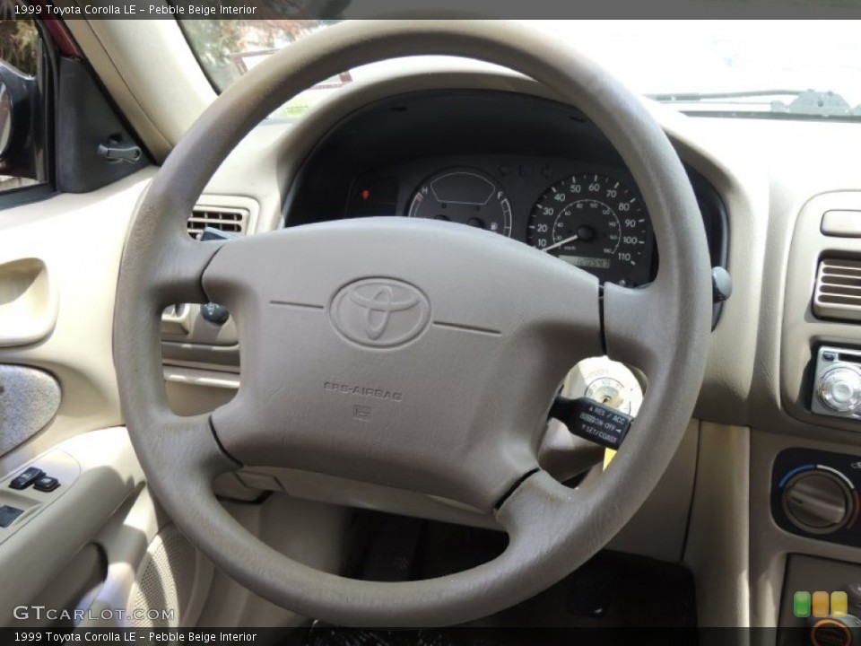 Pebble Beige Interior Steering Wheel for the 1999 Toyota Corolla LE #83791660