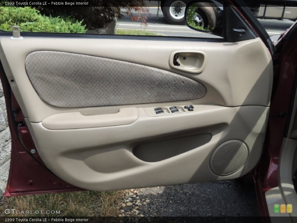 Pebble Beige Interior Door Panel for the 1999 Toyota Corolla LE #83791686