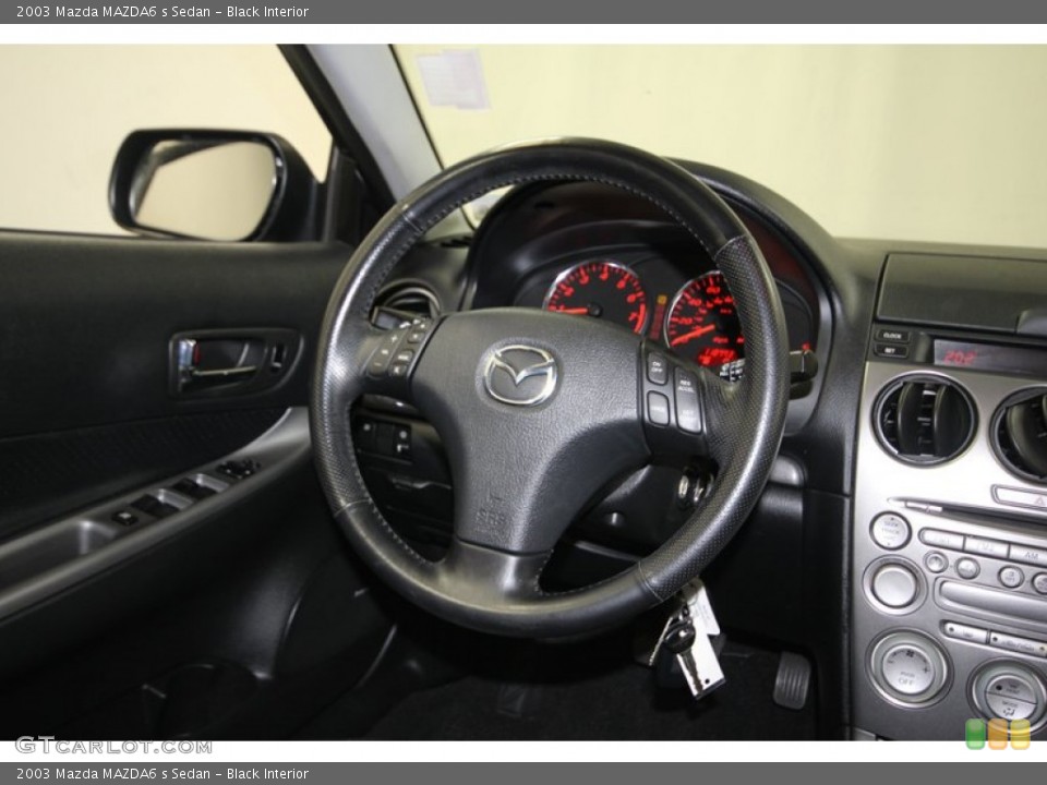 Black Interior Steering Wheel for the 2003 Mazda MAZDA6 s Sedan #83800228