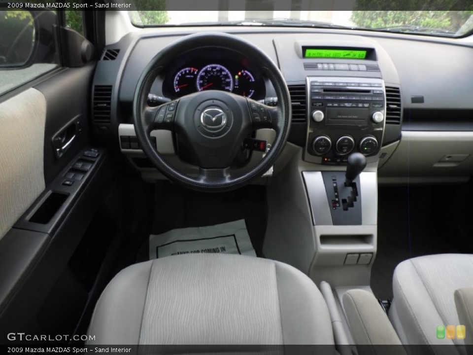 Sand Interior Dashboard for the 2009 Mazda MAZDA5 Sport #83806132
