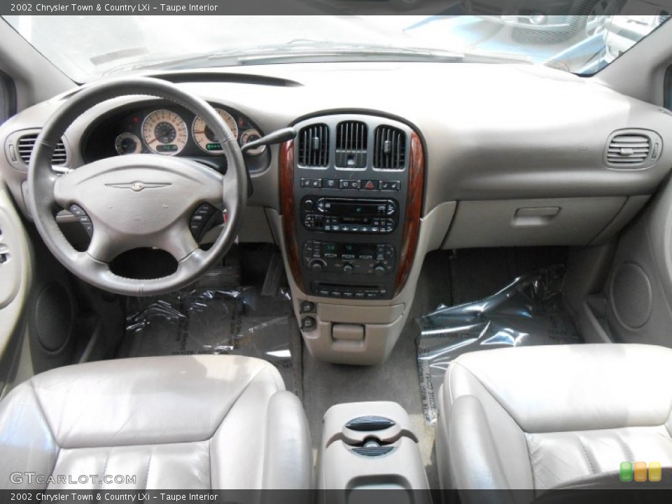Taupe Interior Dashboard for the 2002 Chrysler Town & Country LXi #83812360