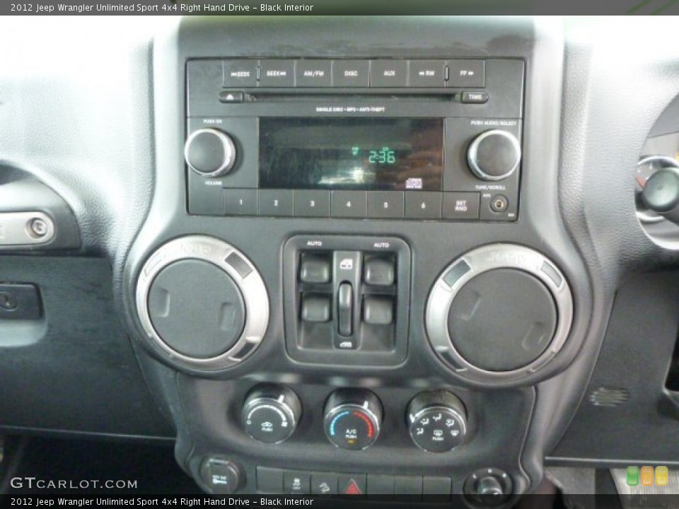 Black Interior Controls for the 2012 Jeep Wrangler Unlimited Sport 4x4 Right Hand Drive #83820250