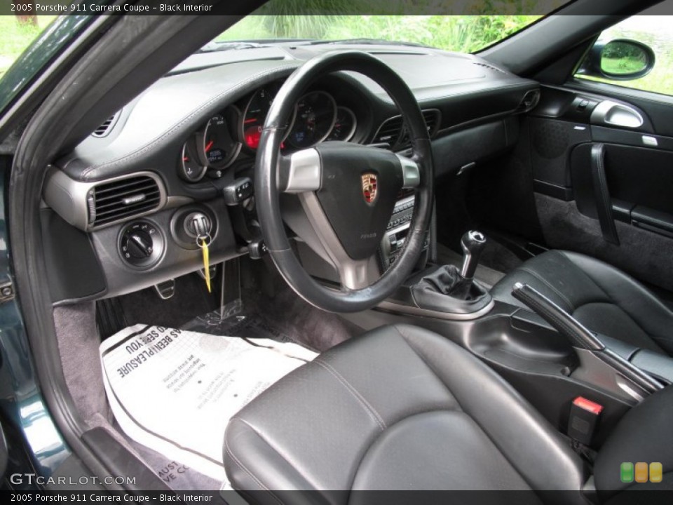 Black Interior Prime Interior for the 2005 Porsche 911 Carrera Coupe #83827819