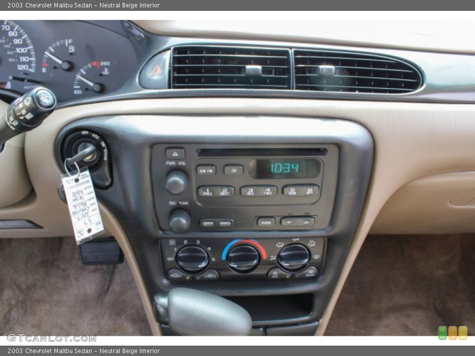 Neutral Beige Interior Controls for the 2003 Chevrolet Malibu Sedan #83829841
