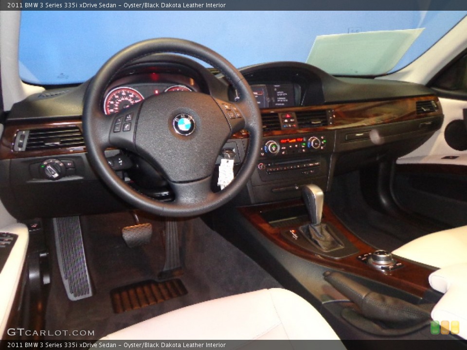 Oyster/Black Dakota Leather Interior Dashboard for the 2011 BMW 3 Series 335i xDrive Sedan #83854452