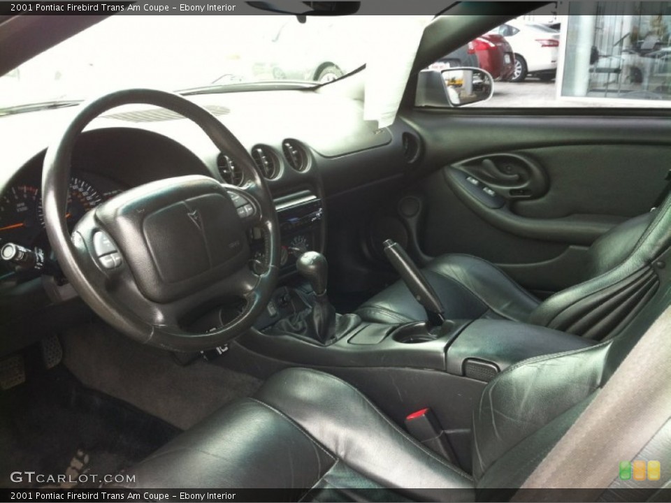 Ebony Interior Prime Interior for the 2001 Pontiac Firebird Trans Am Coupe #83858631