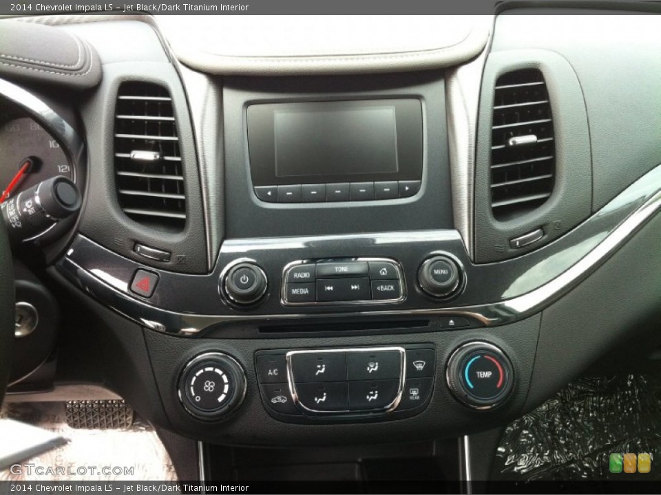 Jet Black/Dark Titanium Interior Controls for the 2014 Chevrolet Impala LS #83902741