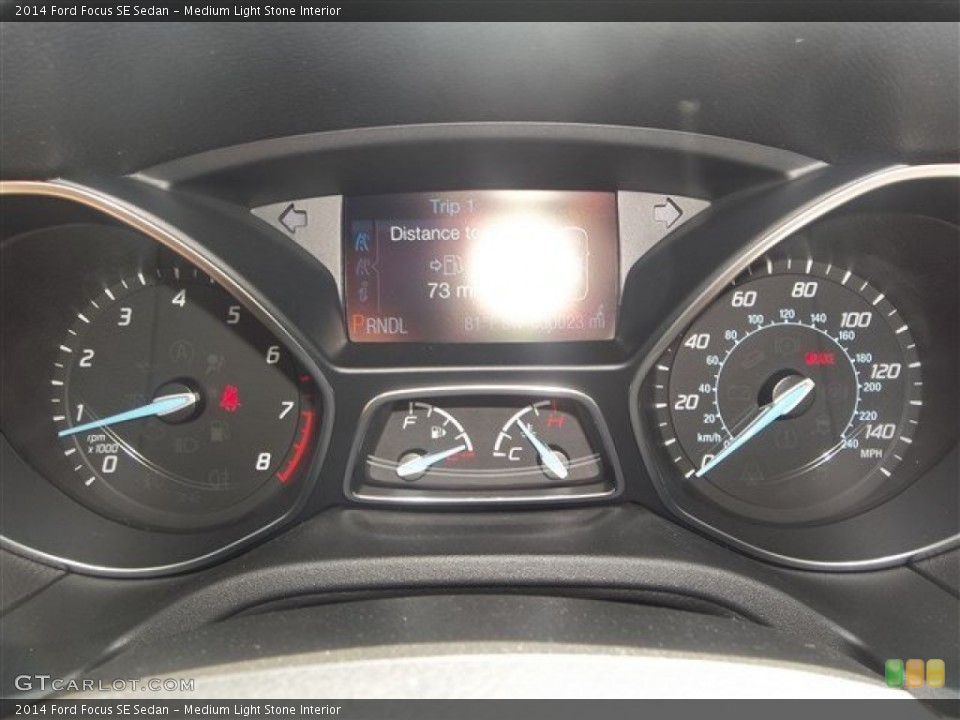 Medium Light Stone Interior Gauges for the 2014 Ford Focus SE Sedan #83910721