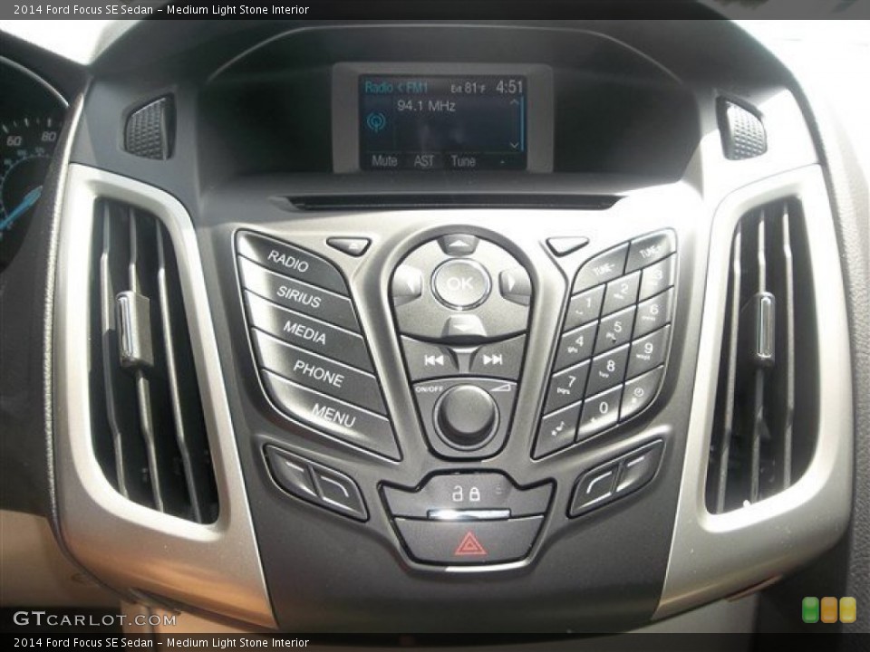 Medium Light Stone Interior Controls for the 2014 Ford Focus SE Sedan #83910772