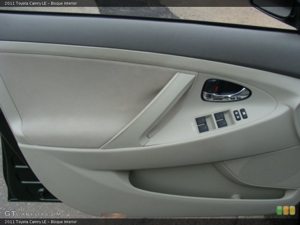 Bisque Interior Door Panel for the 2011 Toyota Camry LE #83956411