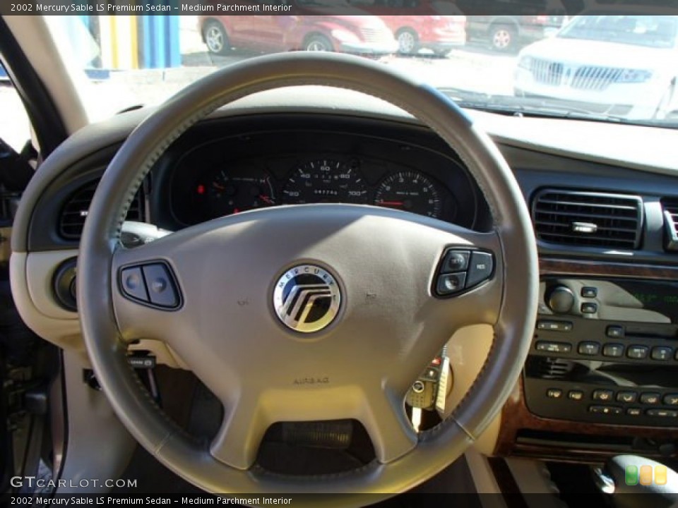 Medium Parchment Interior Steering Wheel for the 2002 Mercury Sable LS Premium Sedan #83985888