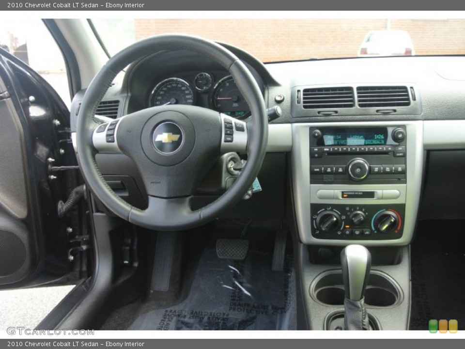 Ebony Interior Dashboard for the 2010 Chevrolet Cobalt LT Sedan #83987736