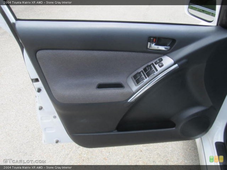 Stone Gray Interior Door Panel for the 2004 Toyota Matrix XR AWD #83998035