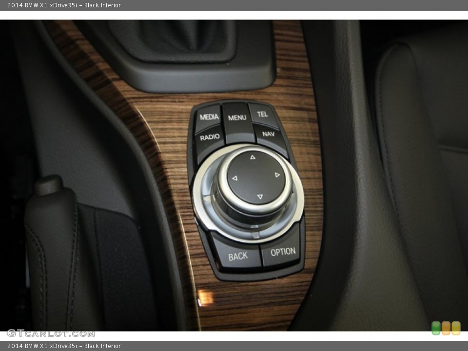 Black Interior Controls for the 2014 BMW X1 xDrive35i #83999652