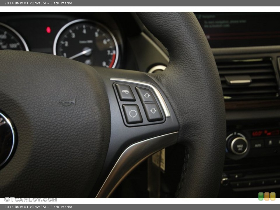 Black Interior Controls for the 2014 BMW X1 xDrive35i #83999715