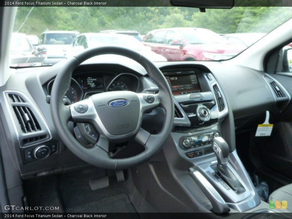 Charcoal Black Interior Dashboard for the 2014 Ford Focus Titanium Sedan #84007104