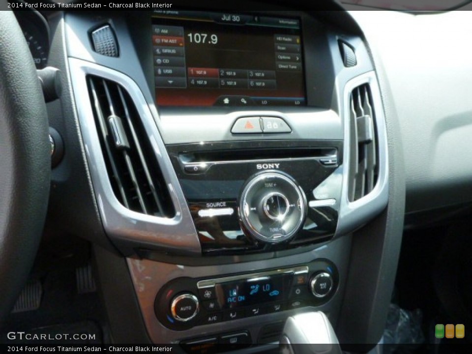 Charcoal Black Interior Controls for the 2014 Ford Focus Titanium Sedan #84007184