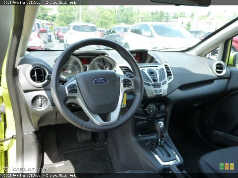 Charcoal Black Interior Dashboard for the 2013 Ford Fiesta SE Sedan #84007440