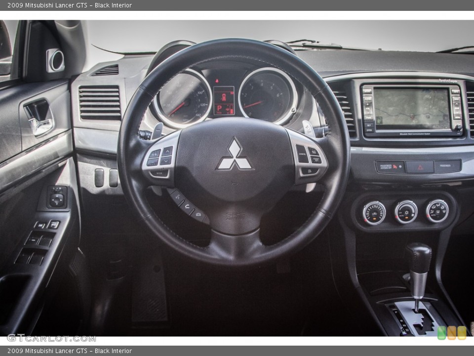 Black Interior Steering Wheel for the 2009 Mitsubishi Lancer GTS #84029160