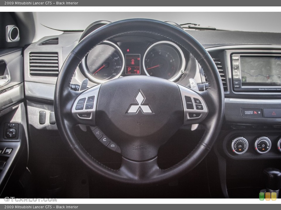 Black Interior Steering Wheel for the 2009 Mitsubishi Lancer GTS #84029595