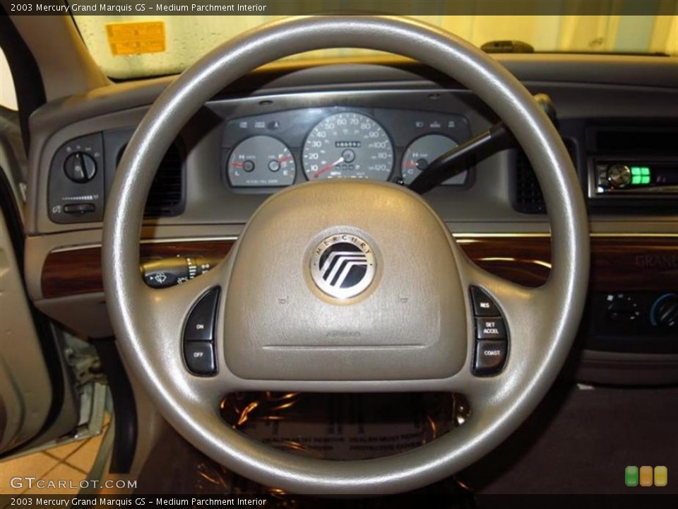 Medium Parchment Interior Steering Wheel for the 2003 Mercury Grand Marquis GS #84045539