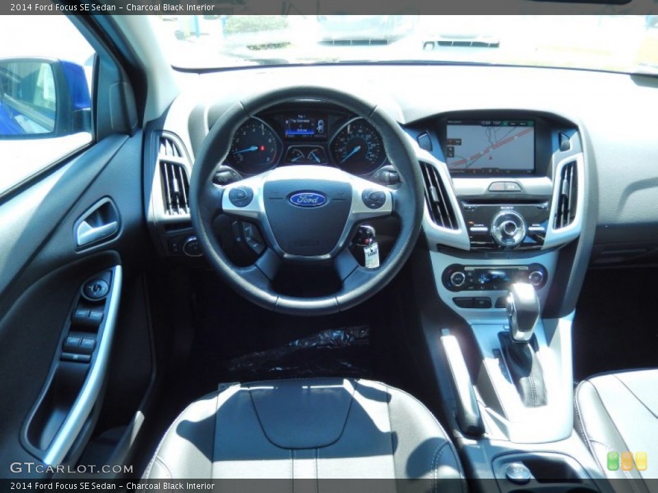 Charcoal Black Interior Dashboard for the 2014 Ford Focus SE Sedan #84068033