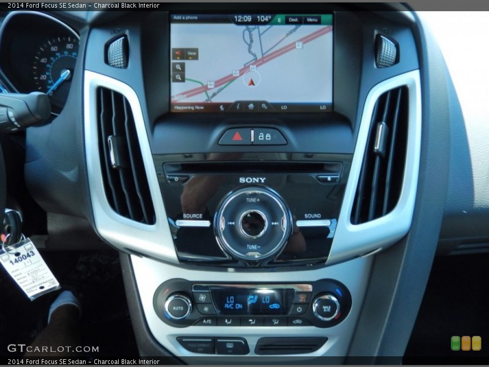 Charcoal Black Interior Controls for the 2014 Ford Focus SE Sedan #84068087