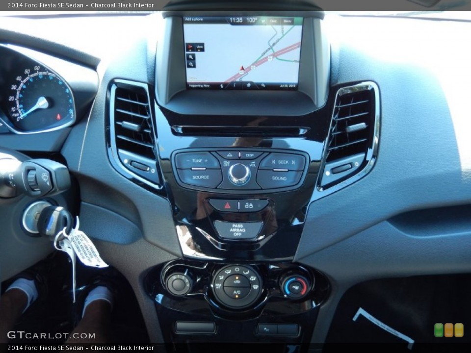 Charcoal Black Interior Controls for the 2014 Ford Fiesta SE Sedan #84068420