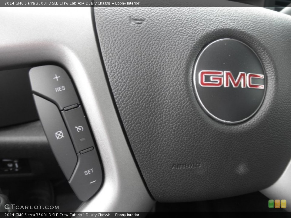 Ebony Interior Controls for the 2014 GMC Sierra 3500HD SLE Crew Cab 4x4 Dually Chassis #84075353