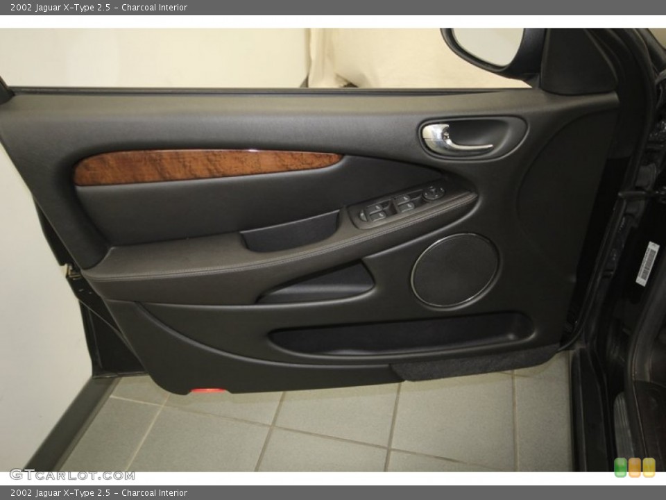 Charcoal Interior Door Panel for the 2002 Jaguar X-Type 2.5 #84076487