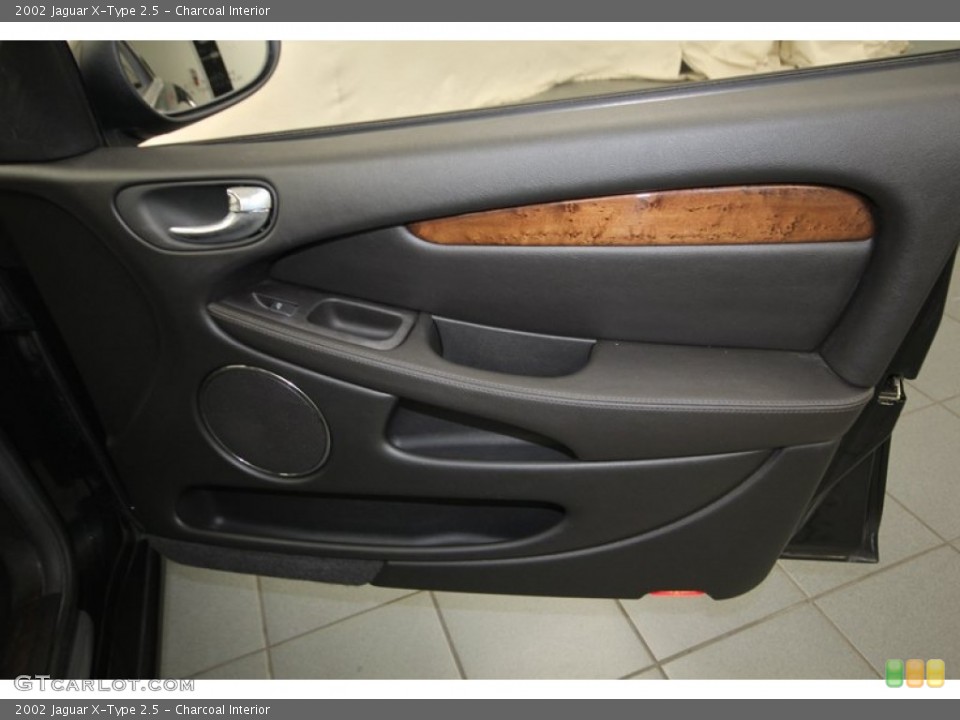 Charcoal Interior Door Panel for the 2002 Jaguar X-Type 2.5 #84077039