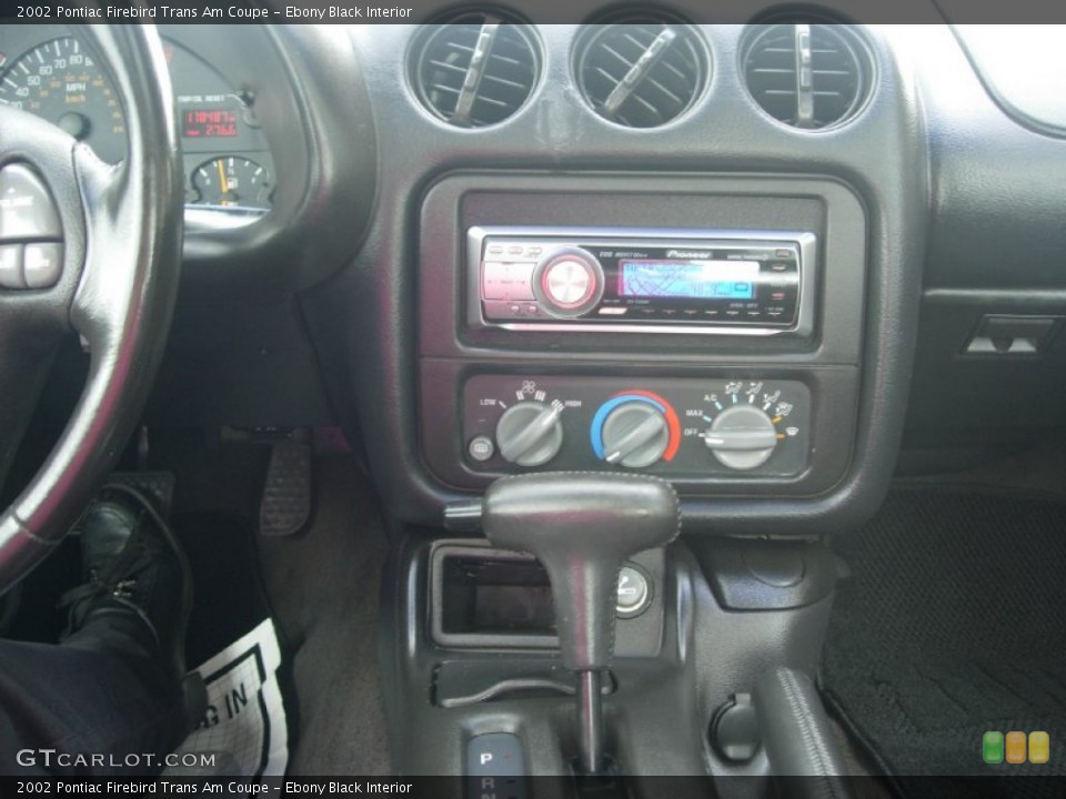 Ebony Black Interior Controls for the 2002 Pontiac Firebird Trans Am Coupe #84104183