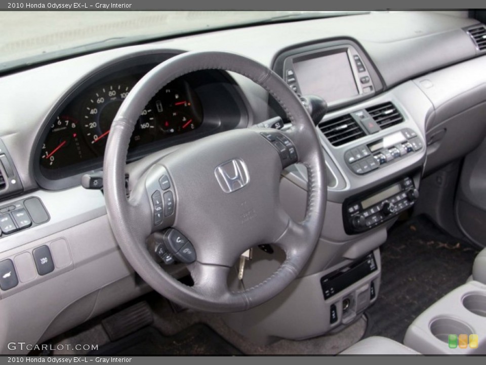 Gray Interior Dashboard for the 2010 Honda Odyssey EX-L #84125586