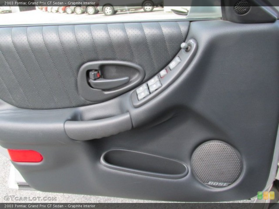Graphite Interior Door Panel for the 2003 Pontiac Grand Prix GT Sedan #84137977