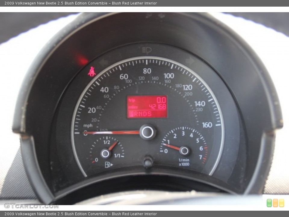 Blush Red Leather Interior Gauges for the 2009 Volkswagen New Beetle 2.5 Blush Edition Convertible #84147432
