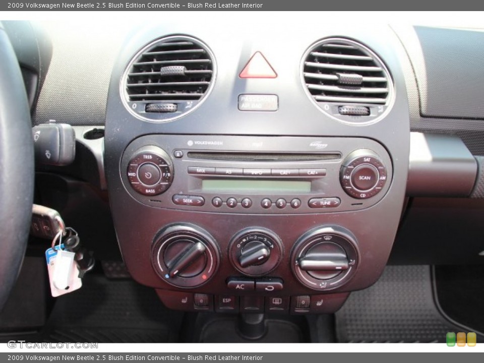 Blush Red Leather Interior Controls for the 2009 Volkswagen New Beetle 2.5 Blush Edition Convertible #84147456
