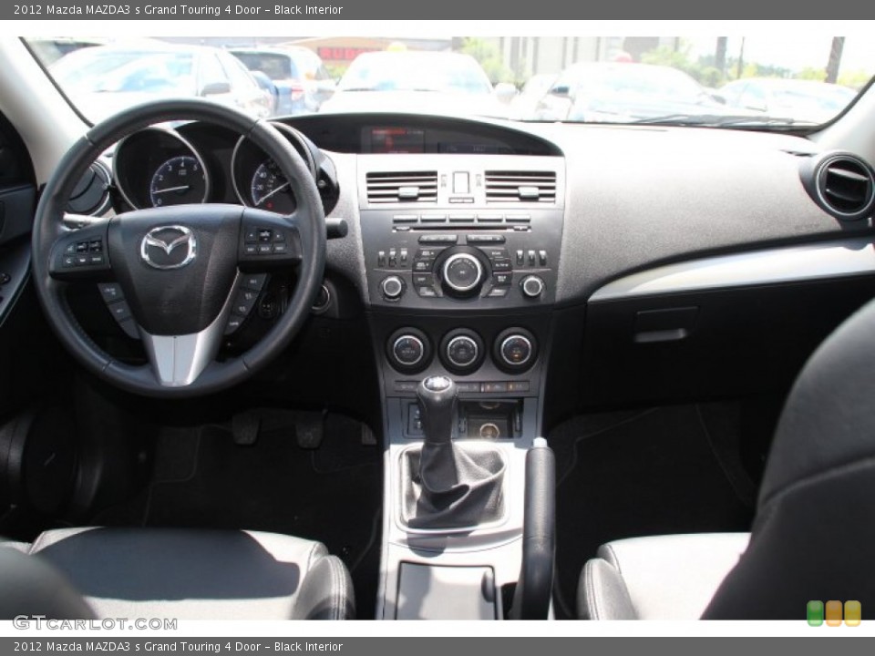 Black Interior Dashboard for the 2012 Mazda MAZDA3 s Grand Touring 4 Door #84149109
