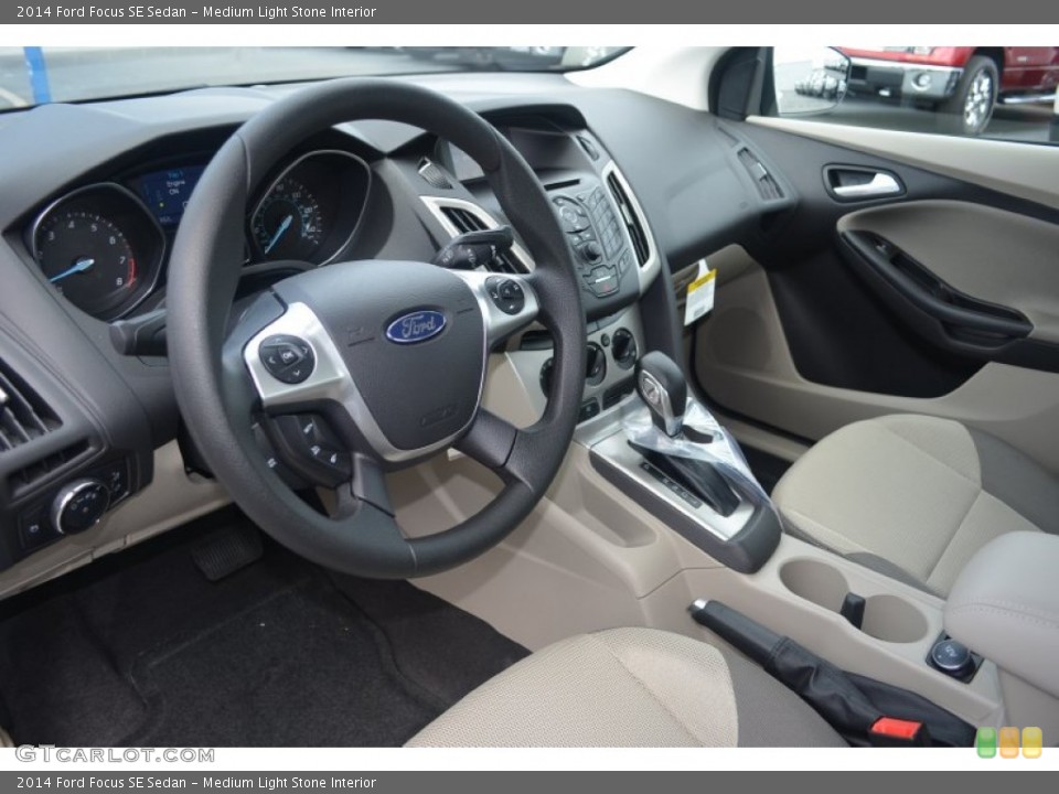 Medium Light Stone Interior Prime Interior for the 2014 Ford Focus SE Sedan #84155530
