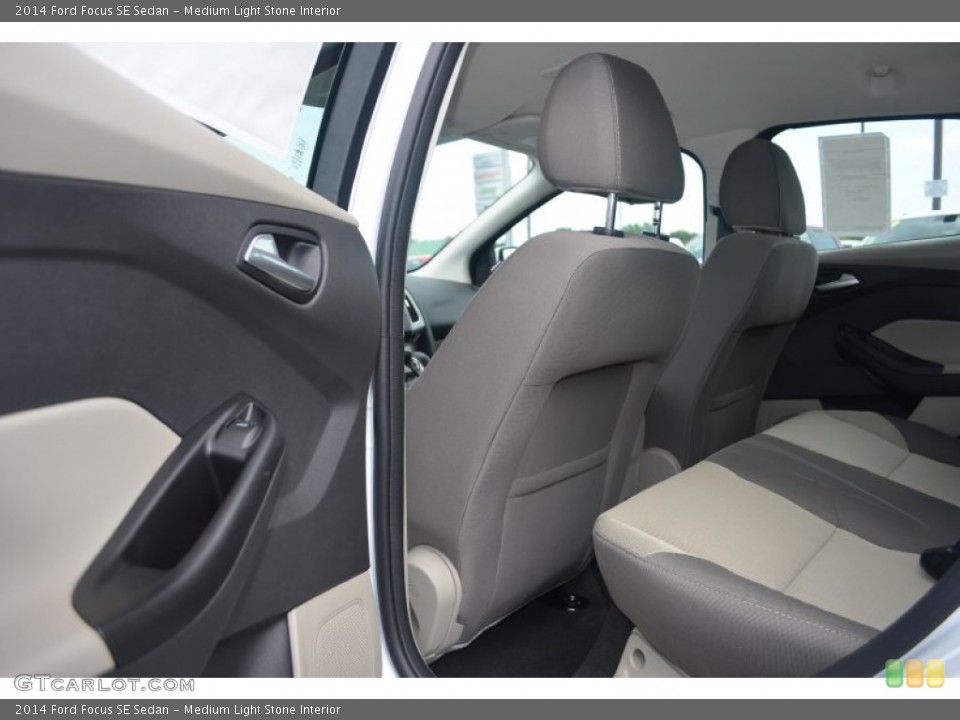 Medium Light Stone Interior Rear Seat for the 2014 Ford Focus SE Sedan #84155556