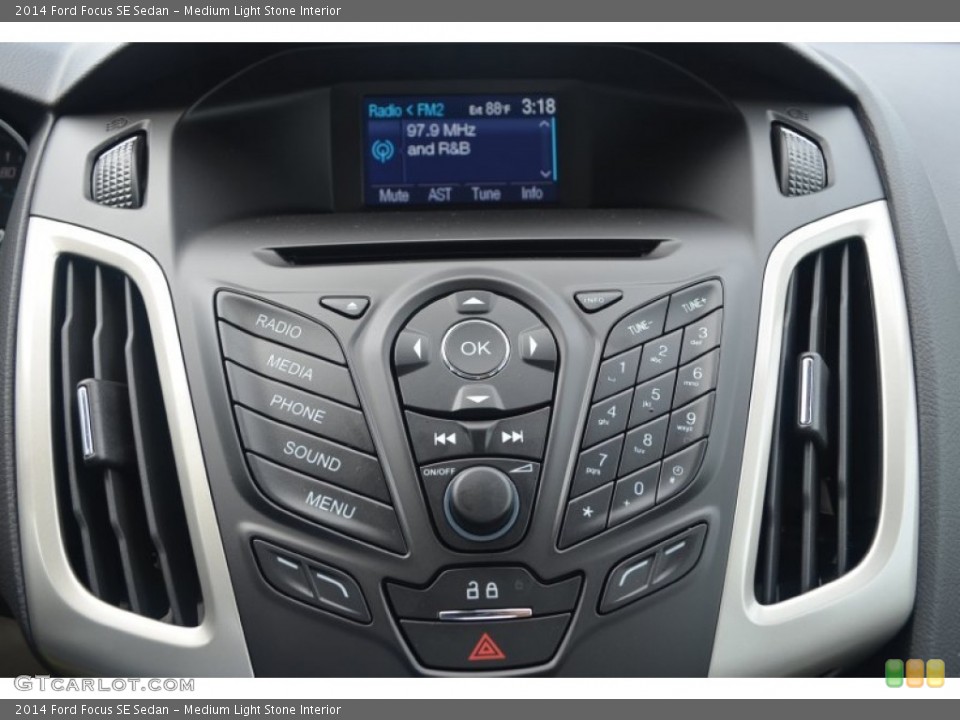 Medium Light Stone Interior Controls for the 2014 Ford Focus SE Sedan #84155655
