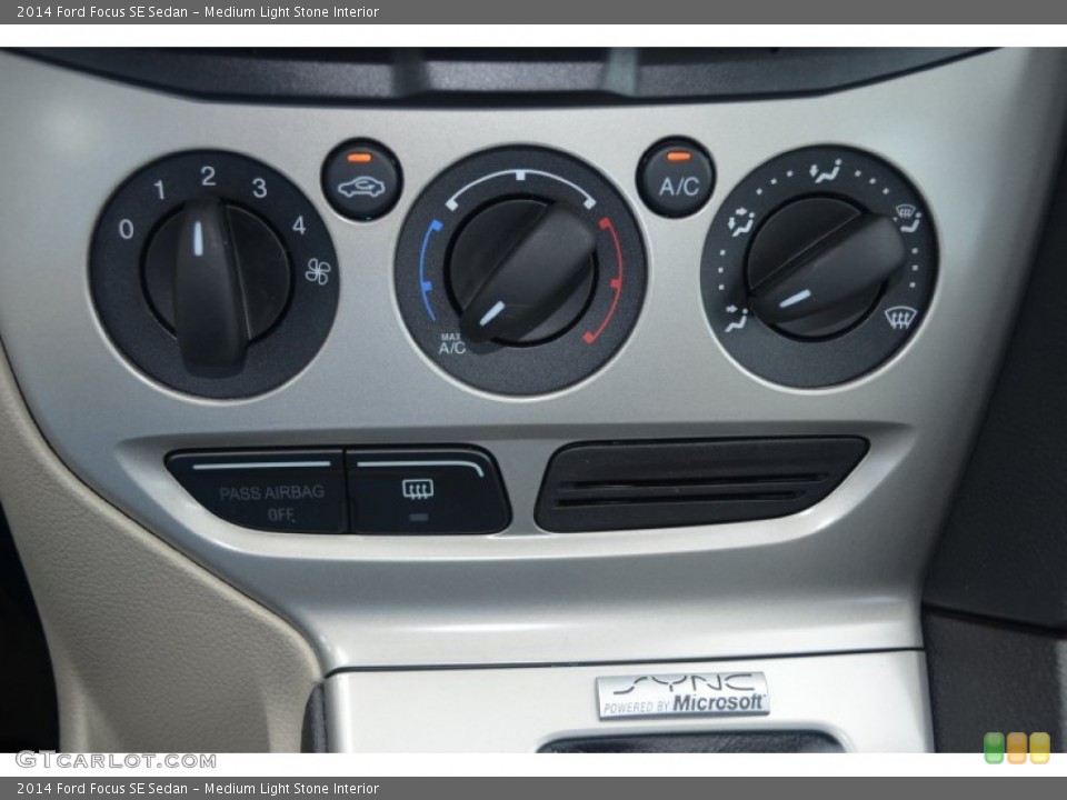Medium Light Stone Interior Controls for the 2014 Ford Focus SE Sedan #84155678