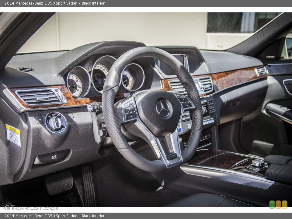Black Interior Dashboard for the 2014 Mercedes-Benz E 350 Sport Sedan #84165186
