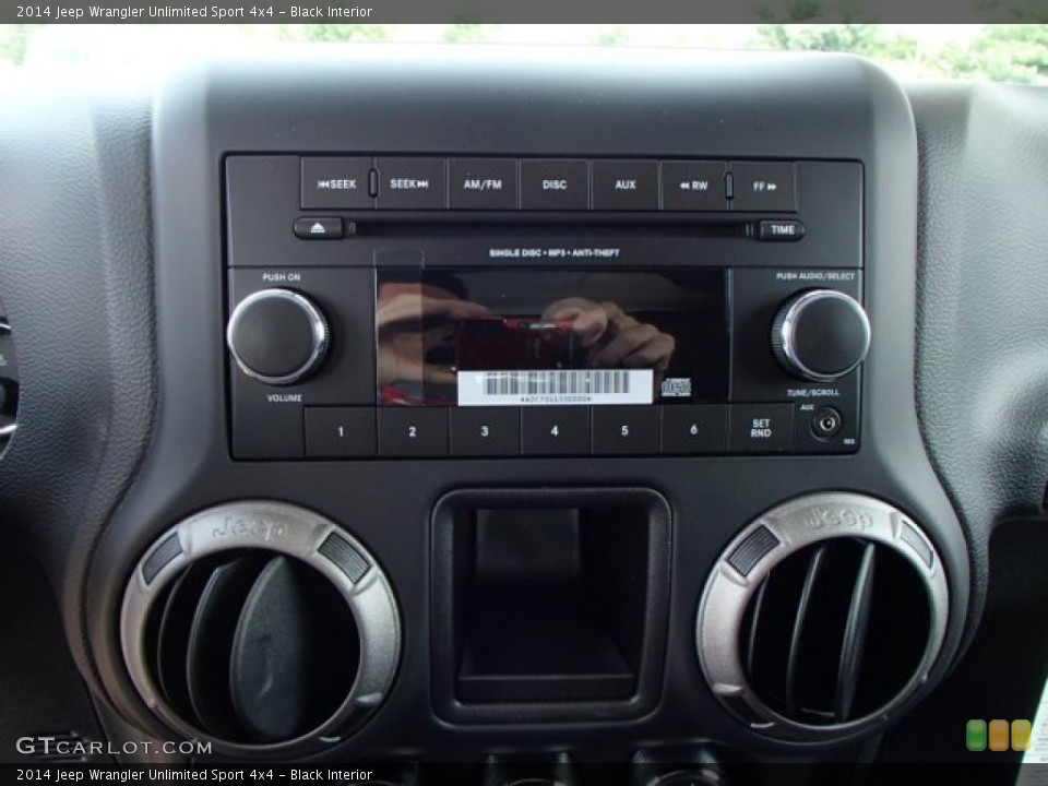 Black Interior Audio System for the 2014 Jeep Wrangler Unlimited Sport 4x4 #84167097
