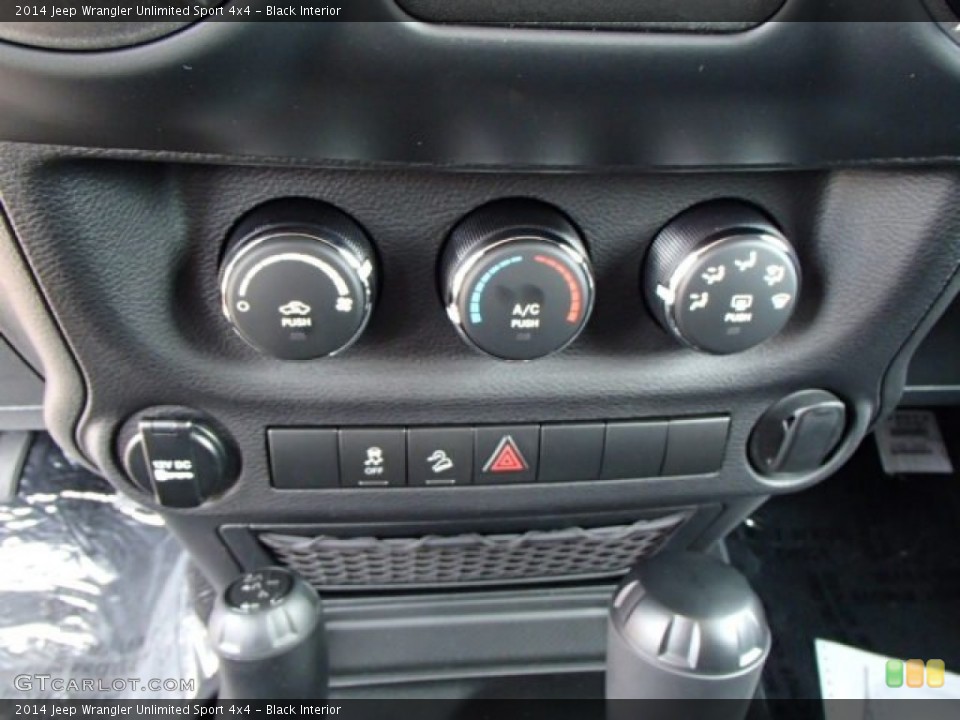 Black Interior Controls for the 2014 Jeep Wrangler Unlimited Sport 4x4 #84167121