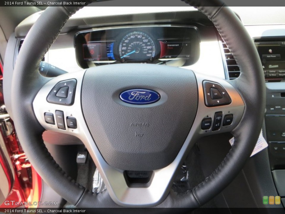Charcoal Black Interior Steering Wheel for the 2014 Ford Taurus SEL #84183954