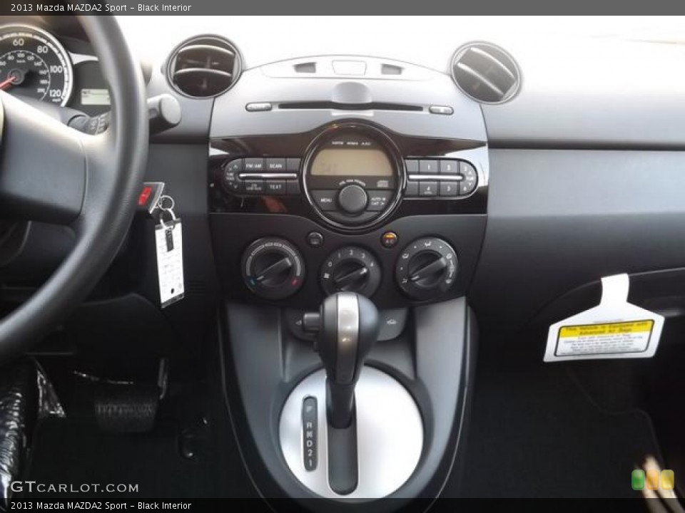 Black Interior Controls for the 2013 Mazda MAZDA2 Sport #84193020