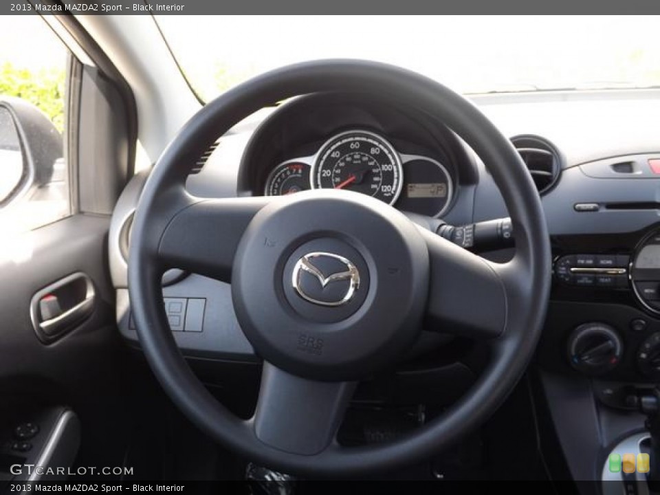 Black Interior Steering Wheel for the 2013 Mazda MAZDA2 Sport #84193023